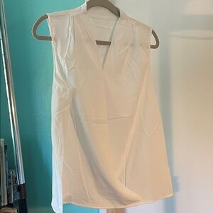 Elegant White Sleeveless Top open front as in picture